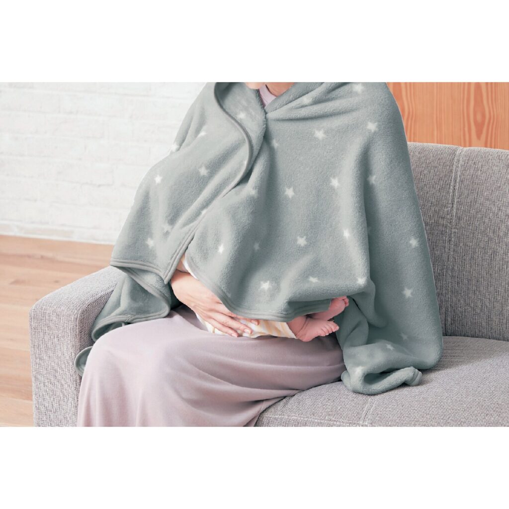 お腹を温める女性のイメージ写真